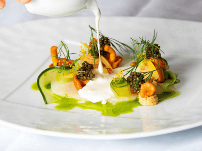 Cured halibut, pickled cucumber, pickled chantarells, cream, oscietra caviar